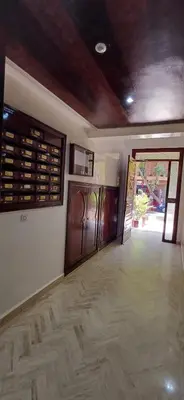 an empty room with a hallway with a door and a room with a door at Résidence hamza appartement 2 chambre in Marrakech