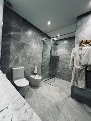 a bathroom with a toilet and a shower at Dream villa in Marrakech