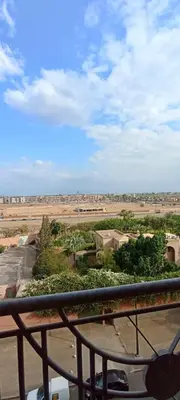 a view of a desert from a balcony at Appartement 2 chambres salon à coté de la gare centre de guéliz 21 in Marrakech