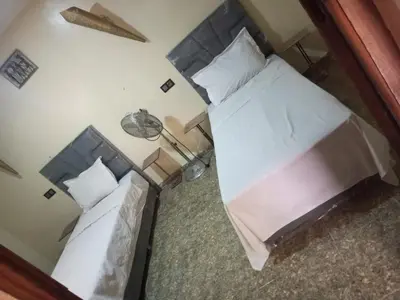 an overhead view of two beds in a bedroom at Maison coco in Marrakech