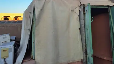 an open door of a building with a tent at Riad Sleeps 2 with Rooftop Views in Marrakech