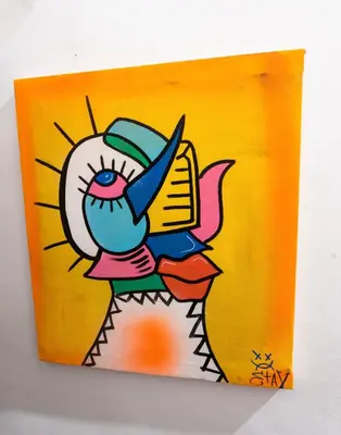 a painting of a cartoon chicken holding a book at Riad Sala Art Marrakech in Marrakech