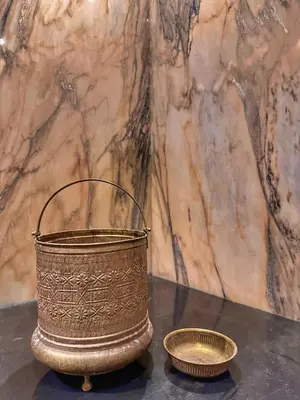 a basket and two bowls sitting on a table at villa argan golf piscine chauffée in Marrakech
