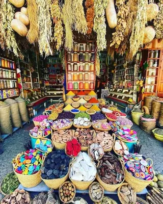 a store filled with lots of baskets of food at Marrakech Reverie Downtown in Marrakech