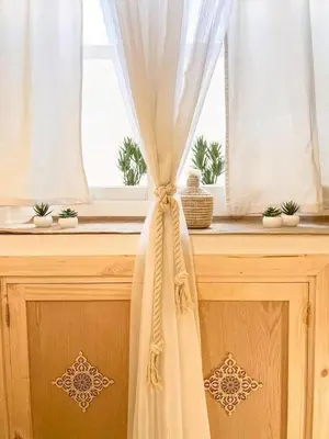 a curtain on a window sill in a room at Studio au coeur de Guéliz in Marrakech