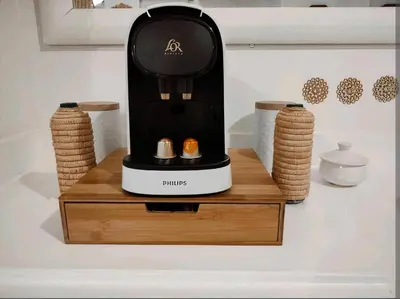 a black and white blender sitting on a wooden stand at Studio au coeur de Guéliz in Marrakech
