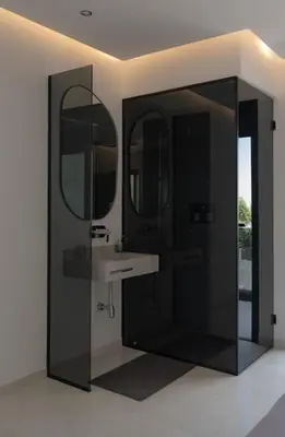 a bathroom with a sink and two mirrors at Villa Volubilis - Marrakech in Marrakech
