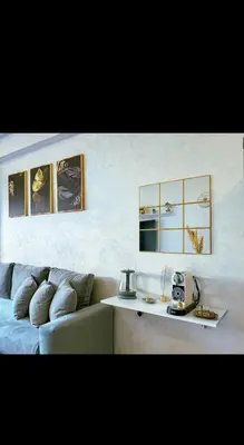 a living room with a couch and a table at Stylish Appartement in Marrakech in Marrakech