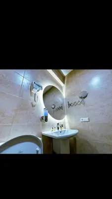 a bathroom with a sink and a toilet at Stylish Appartement in Marrakech in Marrakech