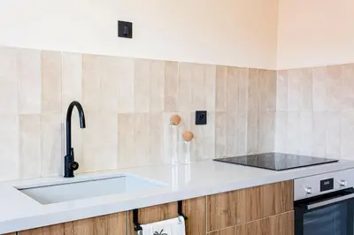 a kitchen with a sink and a counter top at Merveille d'Art & Design - Marrakech Downtown in Marrakech