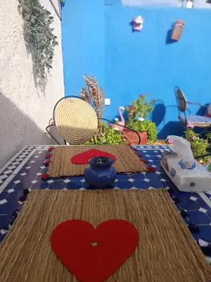 a table with a red heart on top of it at Riad Derb El Aarsa in Marrakech