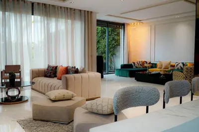 a large living room with couches and chairs at Villa de luxe Avec piscine à Argan Golf Resort in Marrakech