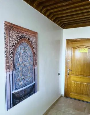 an entrance to a room with a wooden door at New nice apartment city center swimming pool wifi in Marrakech