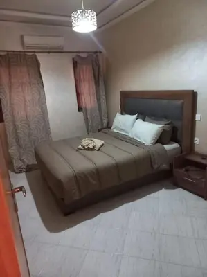 a bedroom with a large bed in a room at Marrakech-Central location 2 Bdrm in Marrakech