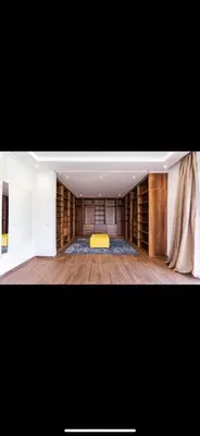 a large room with a yellow bed in the middle at Beautiful villa Argan golf in El Makina