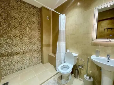 a bathroom with a toilet and a sink at Residence Blida Gueliz 2 Chambres in Marrakech