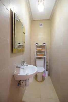 a bathroom with a sink and a toilet at Cosy flat - gueliz residency in Marrakech