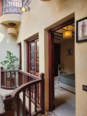 a door leading to a room with a balcony at Riad Mumtaz Marrakech in Marrakech
