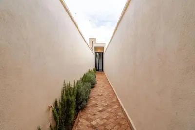 a hallway leading to a building with a doorway at Villa michlo in El Makina