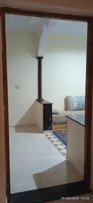 a view of a living room with a stove at Nassim 298 in Marrakech