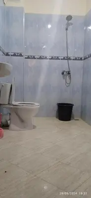a bathroom with a toilet and a shower at Nassim 298 in Marrakech