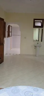 an empty room with a sink and a bathroom at Nassim 298 in Marrakech