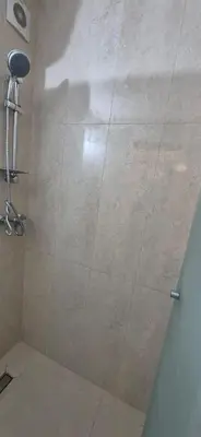 a shower with a glass door in a bathroom at Cozy studio in Marrakech district in Marrakech