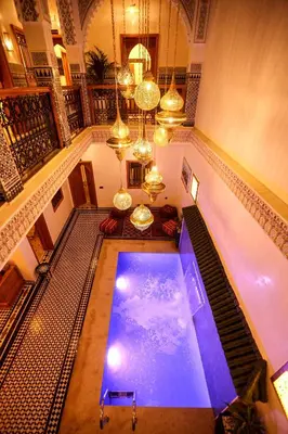 an overhead view of a swimming pool in a building at Riad Palais MERYEM in Marrakech