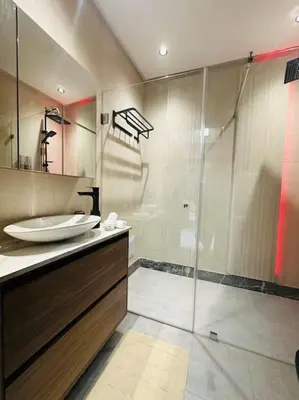 a bathroom with a sink and a shower at Sublime Appartement 1 chambre WIFI à Marrakech in Marrakech