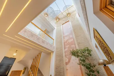 a hallway with a ceiling with a window at Riad SWAN-exclusif - Piscine chauffée - Petit déjeuner in Marrakech