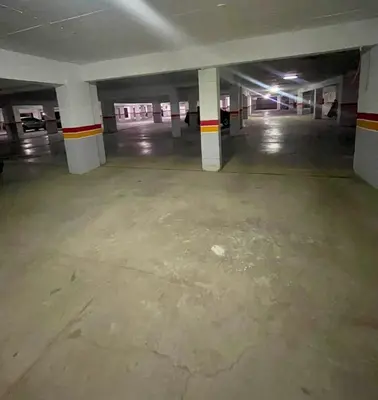 an empty parking lot in an empty parking garage at Appartement luxueux à Marrakech in Marrakech