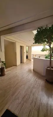 a large room with a tree in the middle of it at Appartement 2 Chambre au Coeur de gueliz Marrakech in Marrakech