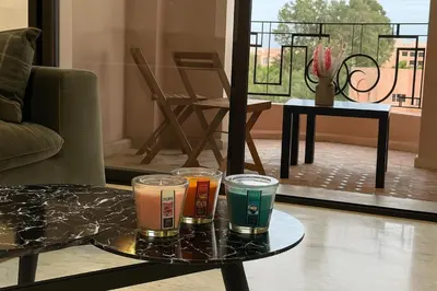 a tray with three different colored drinks on a table at Luxurious M avenue Hivernage - next to Pestana CR7 in Marrakech