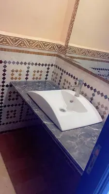 a white sink on a counter in a bathroom at Lot tichka villa n6 in Marrakech