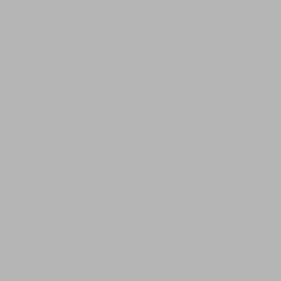 a bedroom with a bed and a table and chairs at Riad Dilia in Marrakech