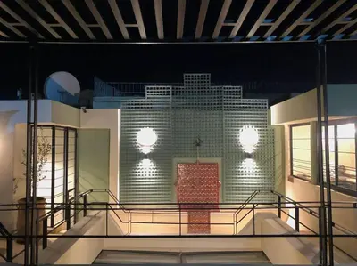 a large building with lights on the side of it at Riad Dardeco privé centre Medina Marrakech in Marrakech