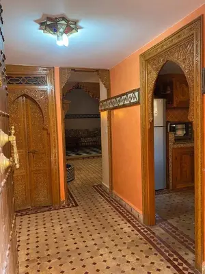 an entrance to a room with an open door at Riad Tichka piscine palmeraie in Marrakech