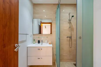 a bathroom with a sink and a shower at Relax Front of Pool - Golf- Fiber Optic in Marrakech