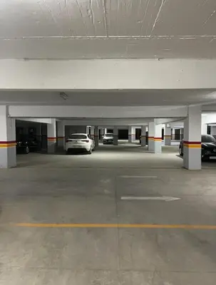 a parking garage with a car parked in it at Appartement au centre de gueliz in Marrakech
