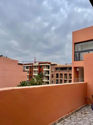 a view of an apartment building from a balcony at Victorious Suites in Marrakech