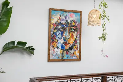 a painting is hanging on a wall at Riad Lamalika in Marrakech