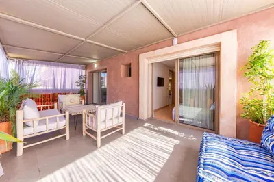 a living room with a couch and a table at 2 Bedrooms Equipped apart in Marrakech