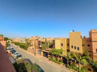 a view of a street in a city with buildings at Rare ! duplex avec vue sur les toits de Marrakech in Marrakech