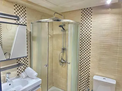 a bathroom with a shower and a sink at Stylish & Comfy Appartment Haven 5 Stars Location Plaza Views in Marrakech