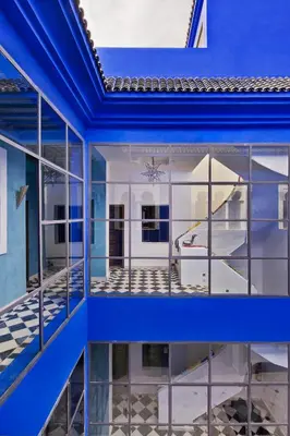 an aerial view of a house with blue walls and windows at Riad Goloboy in Marrakech