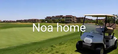 a golf cart on a course with the words nova home at Marrakech prestigia rez-de-jardin avec accès direct piscine golf in Marrakech