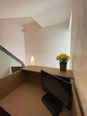 an office with a desk with a computer on it at Appartement Neuf et Moderne in Marrakech