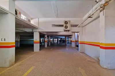 an empty underground parking garage with a speaker in it at Best location new appart hivernag Pool FreeParking in Marrakech