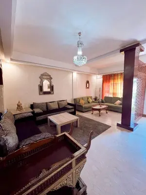 a living room with couches and a pool table at Casa Lina in Marrakech