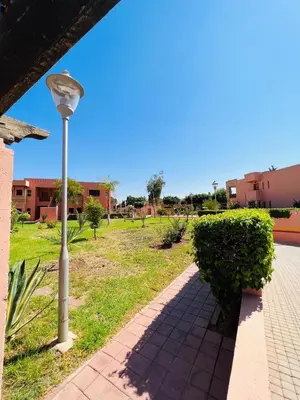 a street light next to a brick sidewalk at Casa Lina in Marrakech